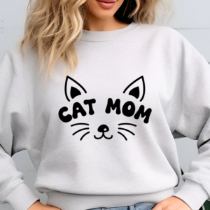 Sweatshirt "CAT MOM"  Sudadera perfecta para todas las amantes de los gatos! Esta prenda no solo es cómoda y cálida, sino que también refleja tu amor por esos adorables felinos. Hecha de una suave mezcla de algodón y poliéster, esta sudadera es ideal para cualquier ocasión, ya sea para quedarte en casa, salir a pasear con tu gato o reunirte con amigos.