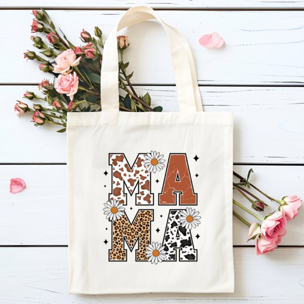 Tote Bag "Mama animal Print" ¡Celebra el Día de las Madres con estilo y fe! Presentamos nuestra tote bag "Mama Animal Print", una hermosa combinación de moda y espiritualidad. Esta tote bag cuenta con un diseño elegante de estampado animal que resalta la fuerza y la belleza de todas las mamás.